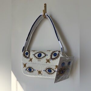Viral Beaded Eye shoulder Bag and earring set